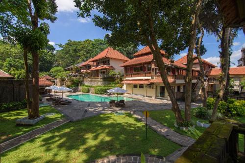 an aerial view of a resort with a swimming pool at Champlung Sari Hotel and Spa Ubud in Ubud