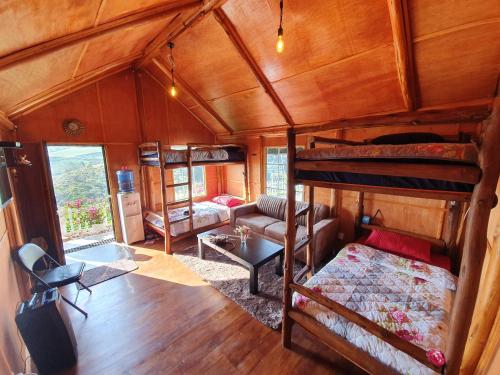 an overhead view of a room with bunk beds at Charley's Heaven Ambewela in Ambawela