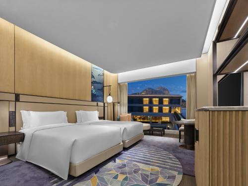 Angsana Suzhou Shishanにあるベッド