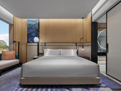 Angsana Suzhou Shishanにあるベッド