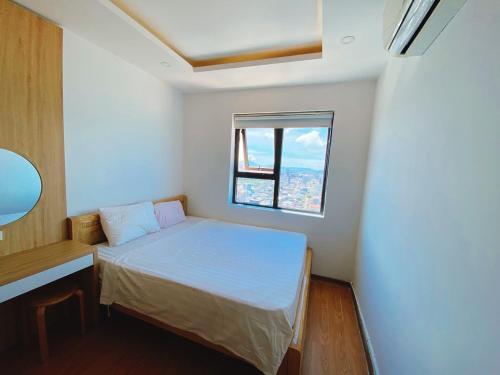 Postelja oz. postelje v sobi nastanitve Mường Thanh Apartment Luxury Đà Nẵng
