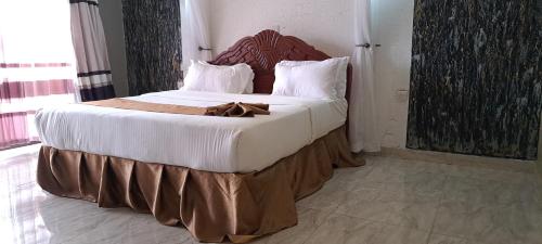 Postel nebo postele na pokoji v ubytování Epashikino Resort & Spa