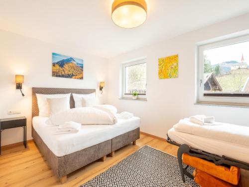 a bedroom with two beds and a window at Apartment in Uderns near Spieljoch Ski in Uderns