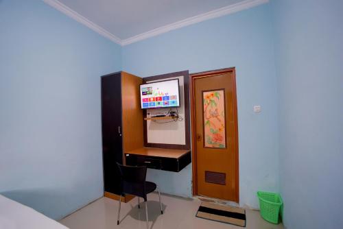 Μια τηλεόραση ή/και κέντρο ψυχαγωγίας στο Bayang Brothers Residence By Occupied