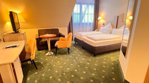 Postel nebo postele na pokoji v ubytování Landhotel Heimathenhof