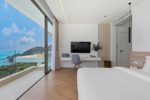 Μια τηλεόραση ή/και κέντρο ψυχαγωγίας στο Villa The Wave 2 Residence