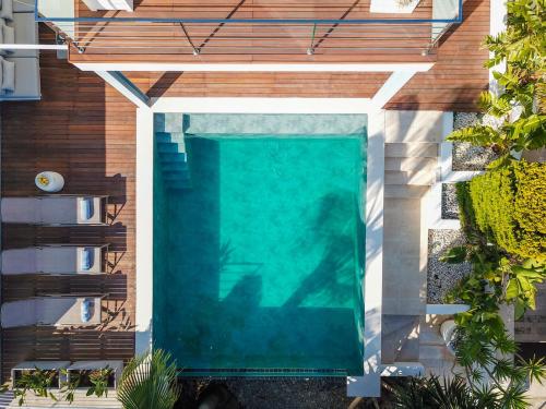 an overhead view of a swimming pool in a house at Designer Alcanada in Alcudia