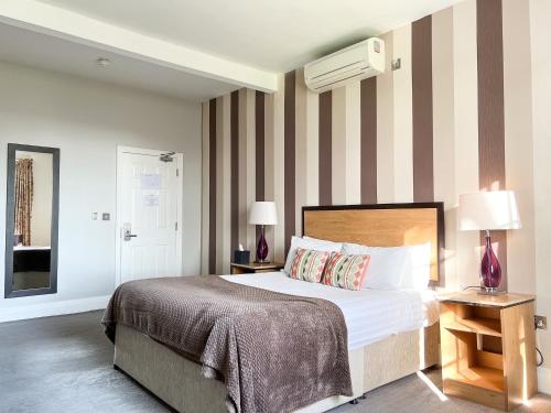 Katil atau katil-katil dalam bilik di The Riverside House Hotel