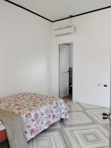 Postel nebo postele na pokoji v ubytování GmL Lodge House