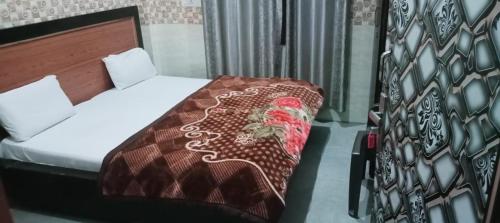 Cama o camas de una habitación en Shri mad bhagavat mandir