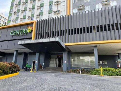 a building with a sign on the side of it at Centrio Budget Amenity Flr GFiber Internet with balcony by Ayala in Cagayan de Oro