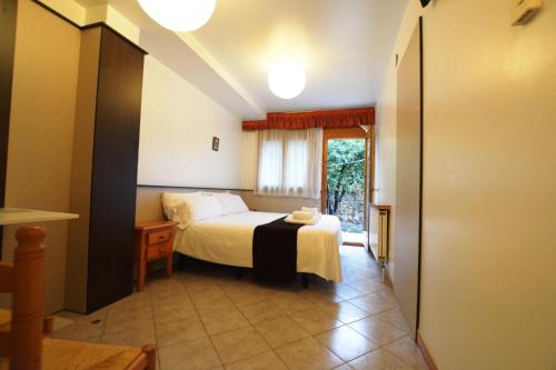 Hotel Posada Guadalupeにあるベッド