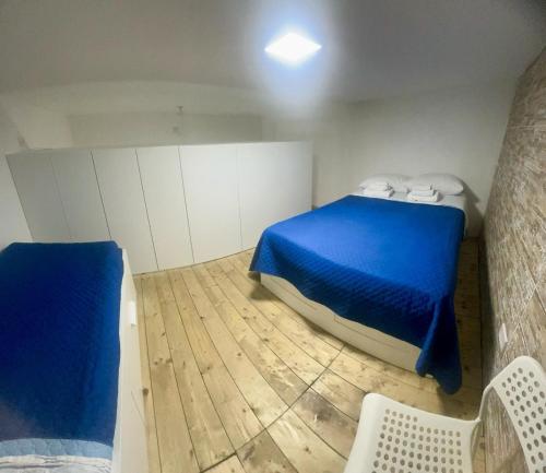 Кровать или кровати в номере Casa Imbriani Napoli