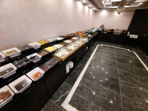 a buffet line with many different types of food at BM HOTEL City in Samsun