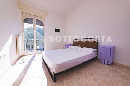 Postel nebo postele na pokoji v ubytování Purple Dreams - Marittima