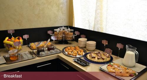 a table with many different types of food on it at INTER BUSINESS Bucharest in Bucharest