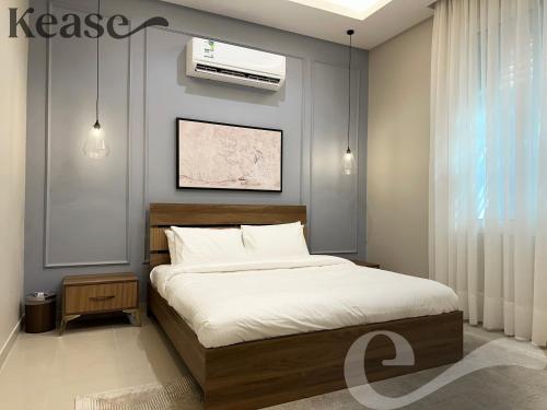 利雅德的住宿－Kease Al-Mutamarat A-4 Timeless History AG51，卧室配有一张床和空调
