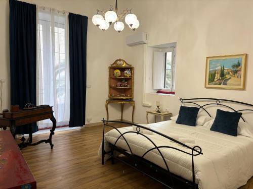 Postel nebo postele na pokoji v ubytování Il Giardino Casa Vacanze
