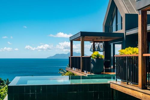 a house with a view of the ocean at Maison Gaia Seychelles, unobstructed views over the ocean and into the sunset in Glacis