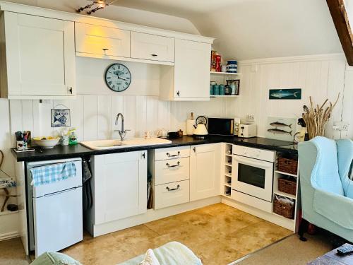 Een keuken of kitchenette bij Jane Austen Flat Lyme Regis