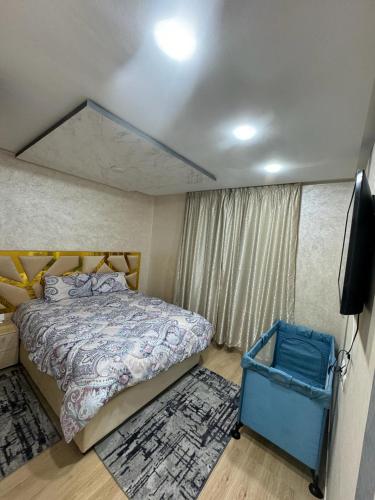 Un pat sau paturi într-o cameră la appart luxe CORALIA 34 IL 7