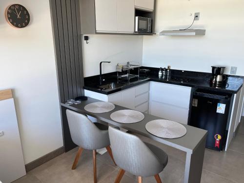 Dapur atau dapur kecil di Resort com Piscina Aquecida e Garagem em Xangri-lá
