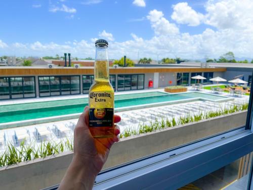 Kolam renang di atau dekat dengan Resort com Piscina Aquecida e Garagem em Xangri-lá