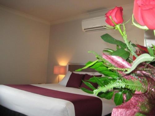 Ένα ή περισσότερα κρεβάτια σε δωμάτιο στο Johnson Road Motel