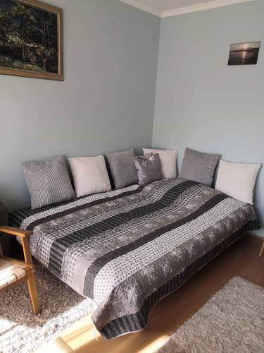 a large bed in a room with at Studio in Csopak - Balaton 48108 in Csopak