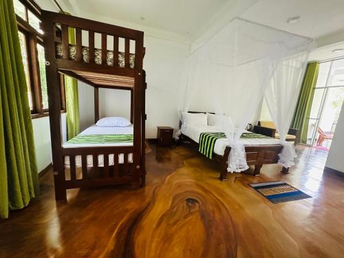 Ένα ή περισσότερα κρεβάτια σε δωμάτιο στο River Splendour Home Stay