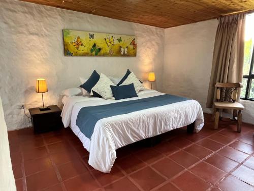 Кровать или кровати в номере Finca Hotel Sol Y Luna
