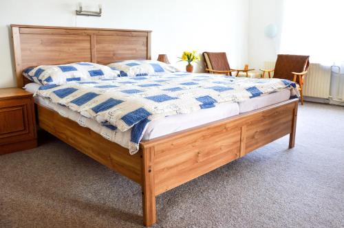 Postel nebo postele na pokoji v ubytování Guest House Kuks