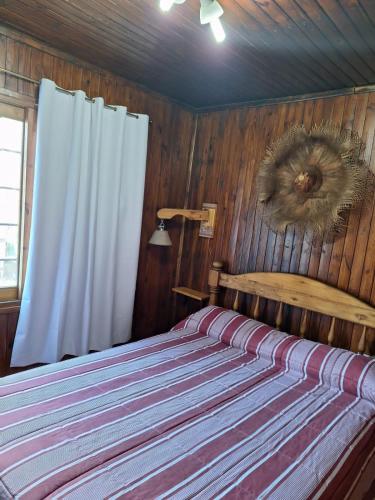 Postel nebo postele na pokoji v ubytování Cabaña Pablo