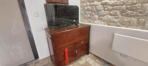 Via Mazzini Homeにあるテレビまたはエンターテインメントセンター