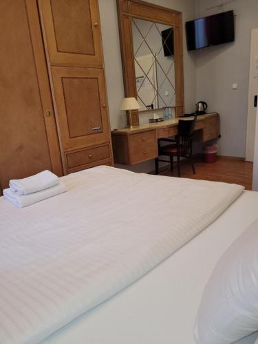 Ένα ή περισσότερα κρεβάτια σε δωμάτιο στο Hotel Franken an der Messe