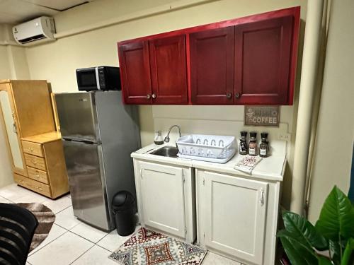 A cozinha ou cozinha compacta de The Corner Apartment