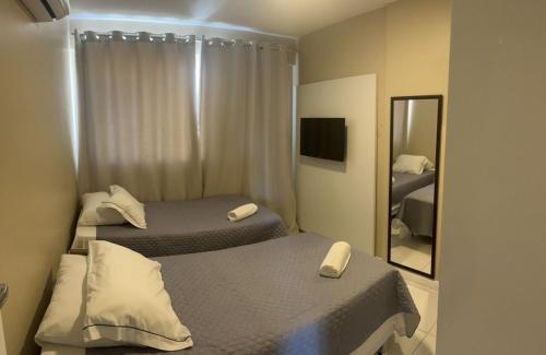 Katil atau katil-katil dalam bilik di MANDAI APARTAMENTO 413