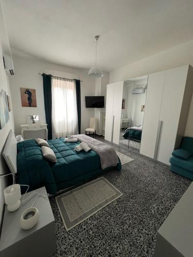 Ένα ή περισσότερα κρεβάτια σε δωμάτιο στο B&B 3 Stelle - La perla bianca