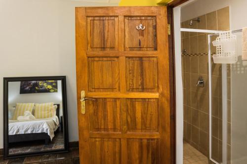 Postel nebo postele na pokoji v ubytování Rozendal Guest House