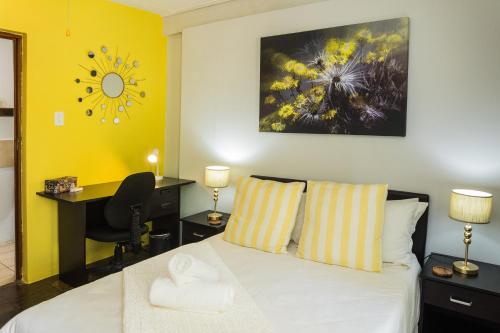 Postel nebo postele na pokoji v ubytování Rozendal Guest House