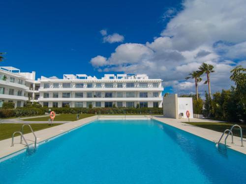 Brand new apartment in Belaire, pools, garden