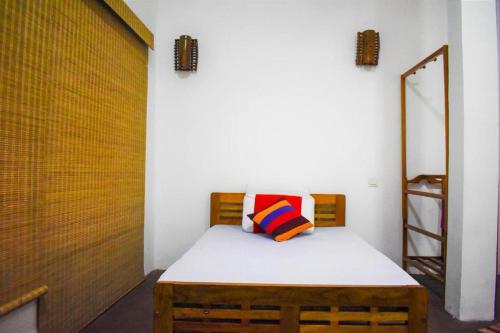 En eller flere senge i et værelse på Extream Adventures of Sri Lanka