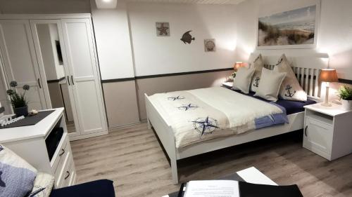 Ένα ή περισσότερα κρεβάτια σε δωμάτιο στο Appartement im Stall "Lune River Ranch"