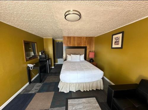 Postel nebo postele na pokoji v ubytování Motel Nicholas