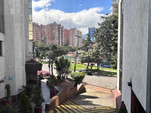a view of a city street from a building at Hotel Bogotá Regency Usaquén in Bogotá
