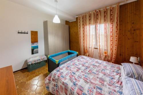 מיטה או מיטות בחדר ב-Affittibreviferrera Appartamento Ilenia