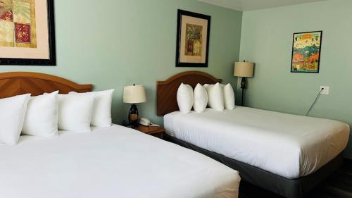 Ένα ή περισσότερα κρεβάτια σε δωμάτιο στο Adventure Inn - Glenwood Springs