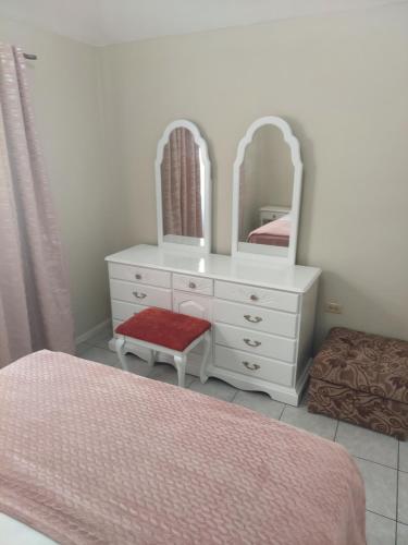 Ein Bett oder Betten in einem Zimmer der Unterkunft Exquisite