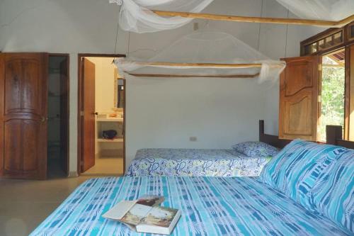 Una cama o camas en una habitación de Casa Majanicho