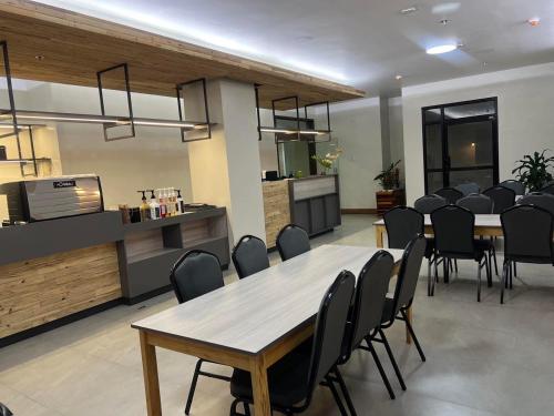 a conference room with a table and chairs at Soleo Inn in Baguio